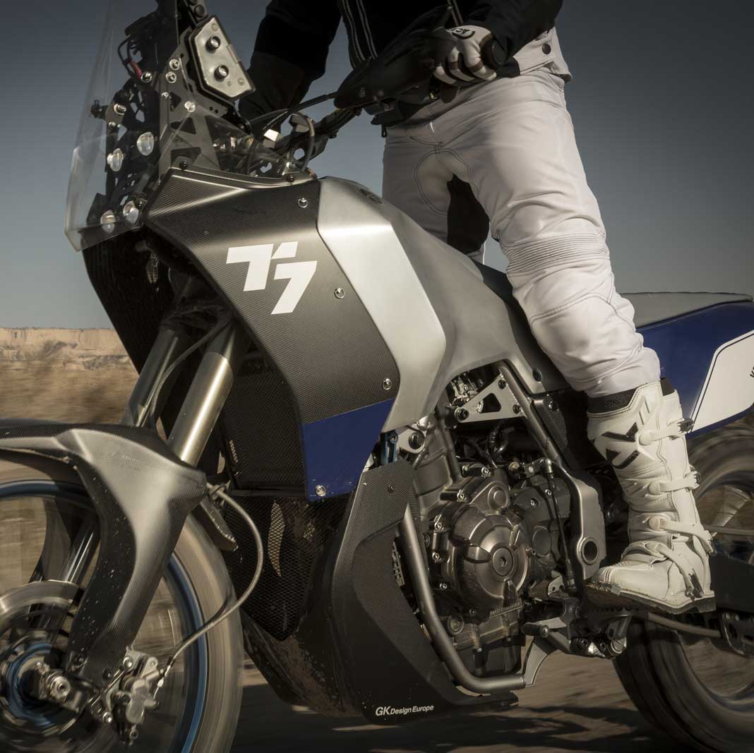 A person riding the 2017 Yamaha T7 dual sport motorcycle concept in the desert